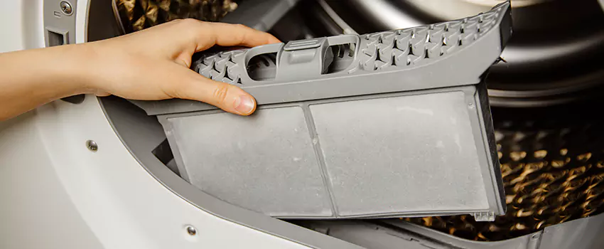 Signs Of A Clogged Dryer Lint Trap in Grandville, Michigan